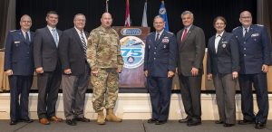 (From left) Col. Barry Melton, Civil Air Patrol Southeast Region commander; Patrick Sheehan, Tennessee Emergency Management Agency director; Lt. Col. and state Rep. John Ragan, commander of the State Legislative Squadron; Lt. Gen. Max Haston, Tennessee Adjutant General; Maj. Gen. Joe Vazquez, CAP national commander; Maj. and State Sen. Jim Tracy, a member of the legislative squadron; Col. Arlinda Bailey, CAP Tennessee Wing commander; and Lt. Col. Andrew Oppmann, Tennessee Wing HQ staff and MTSU vice president for marketing and communications are shown during the CAP 75th annual conference in Nashville. (MTSU photo by Kimi Cunro)