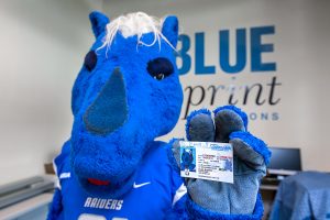 Blue Print Drivers License Kiosk unveiling. Lightning with his license.