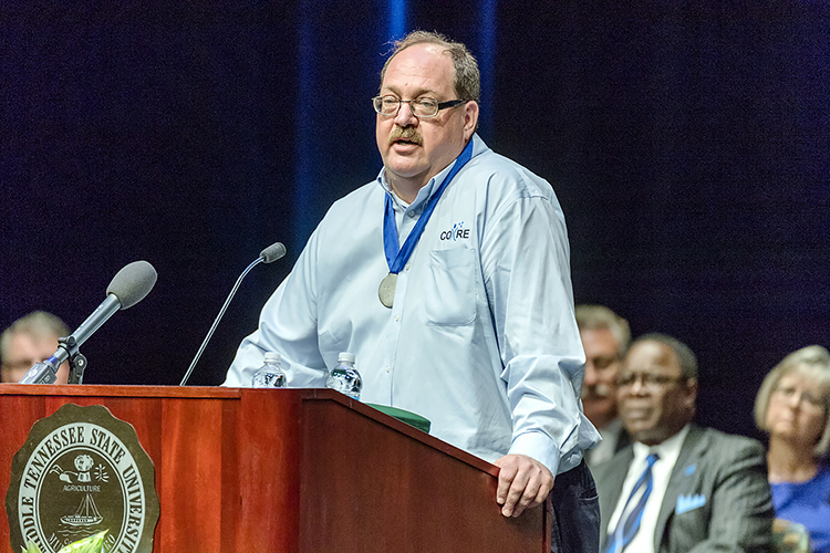 MTSU industrial/organizational psychology professor Michael Hein expresses his gratitude after receiving the 2016 Career Achievement Award Thursday, Aug. 18, during the university’s Fall Faculty Meeting. Hein, who also is the director of MTSU's Center for Organizational and Human Resource Effectiveness, has taught at MTSU since 1990 and received the university’s highest faculty honor from the MTSU Foundation “for the major contributions to his profession, graduate and undergraduate program development, and the stellar educational preparation of his students.” (MTSU photo by J. Intintoli)