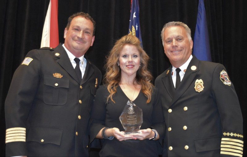 MFRD’s Public Information Officer Ashley McDonald. McDonald was presented with the “President’s Award.”