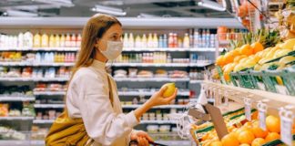woman wearing mask in grocery store