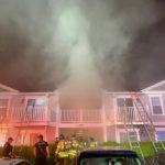 Officer, resident taken to hospital for smoke inhalation after overnight fire; several tenants displaced