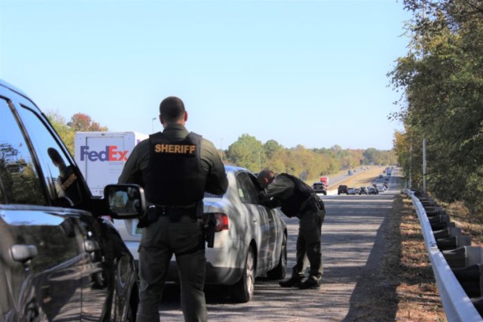 Photo: Sheriff's Deputy Nick Smith and Sgt. J.D. Davis stopped a driver on a traffic violation during the October 