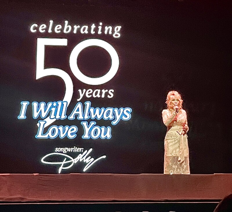 Dolly Parton sings and celebrates one of her favorite songs, I Will Always Love You. Photo by Anne Braly